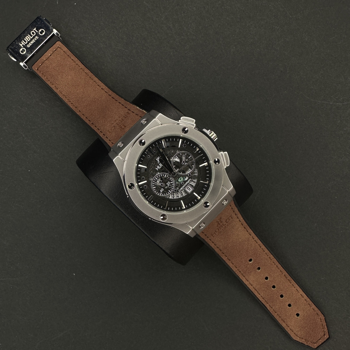 هابلوت مردانه کد(7245) بند قهوه ای تیره قاب نقره ای صفحه مشکی