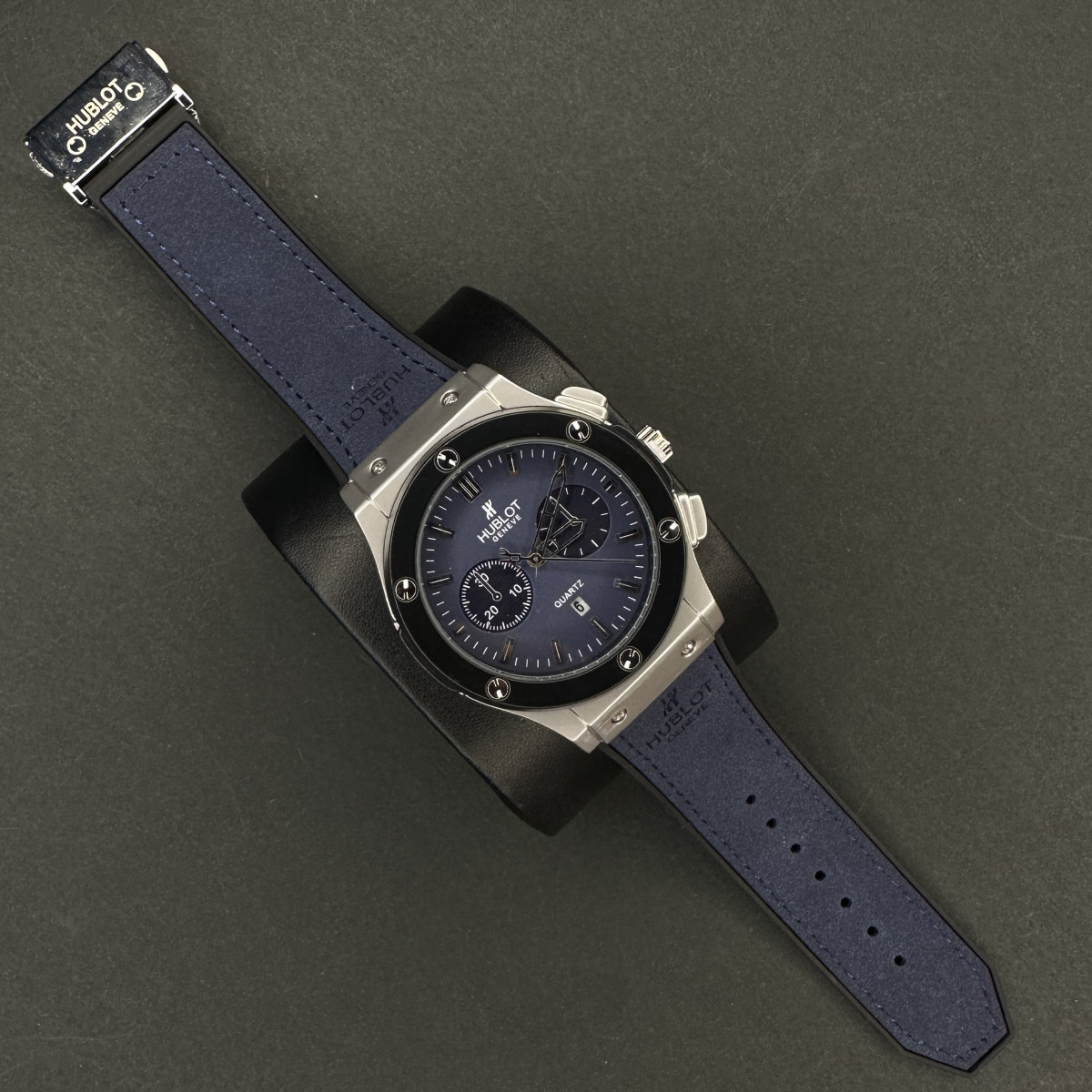 هابلوت مردانه کد(7253) بند سورمه ای قاب نقره ای صفحه سورمه ای