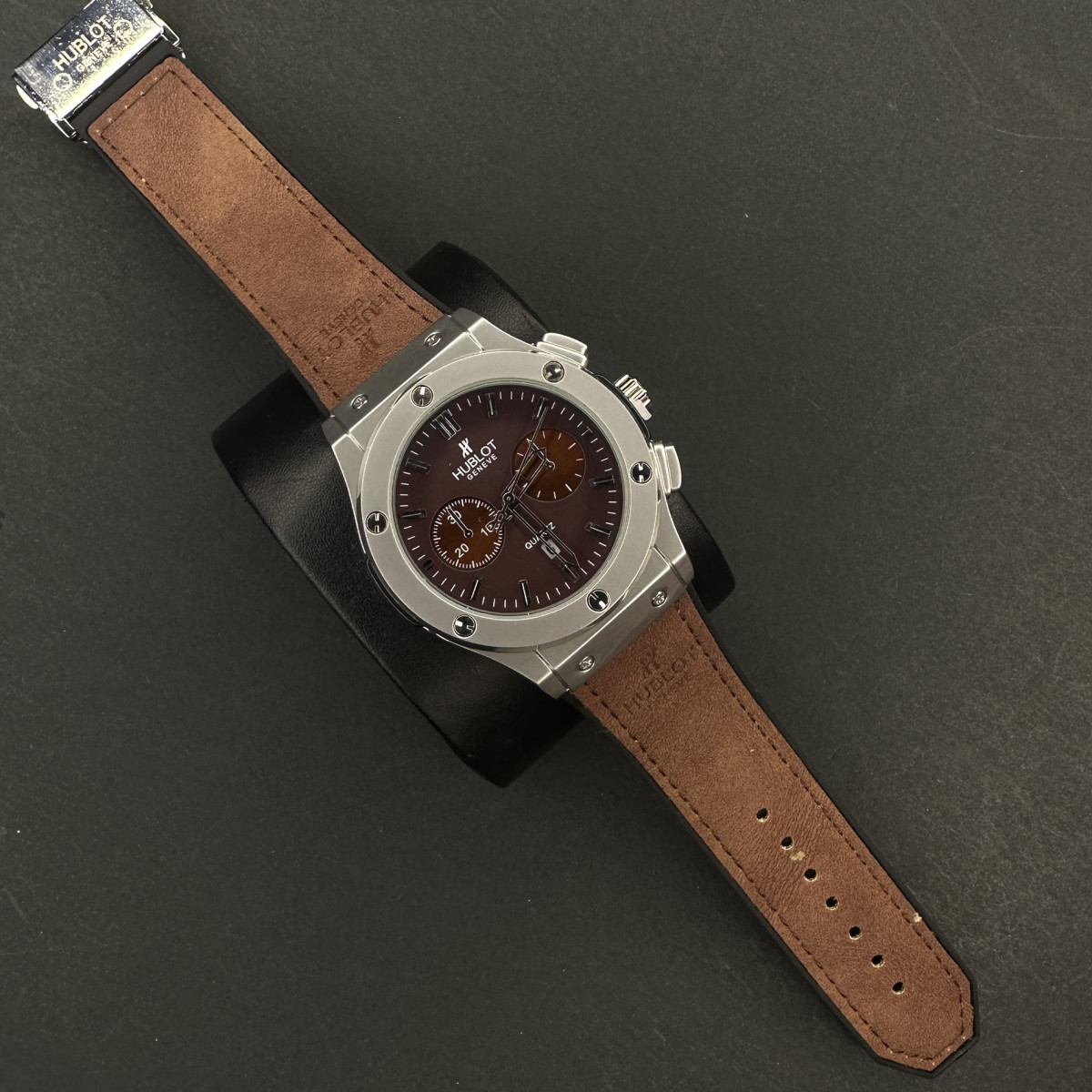 هابلوت مردانه کد(7267)بند قهوه ای قاب نقره ای صفحه قهوه ای