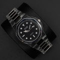 ساعت ایک( 9808)صفحه مشکی قاب نقره ای بند شفاف رگه نقره ای