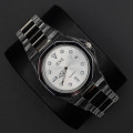 ساعت ایک( 9809)صفحه سفید قاب نقره ای بند شفاف رگه نقره ای