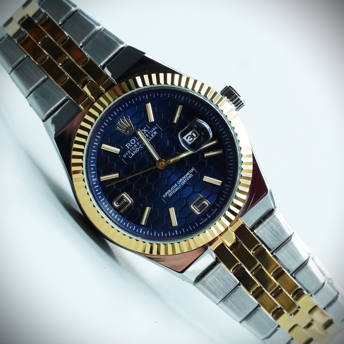 رولکس oyster perpetual مردانه کد (642) بند و قاب نقره ای طلایی صفحه سرمه ای