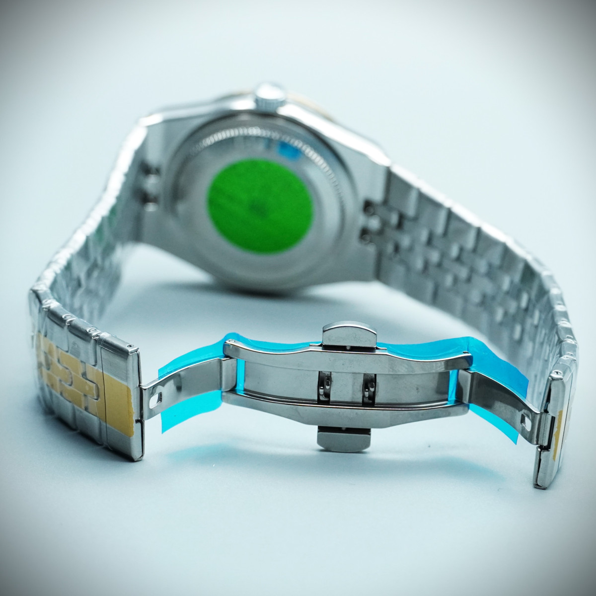 رولکس oyster perpetual مردانه کد (645) بند و قاب نقره ای طلایی صفحه طوسی