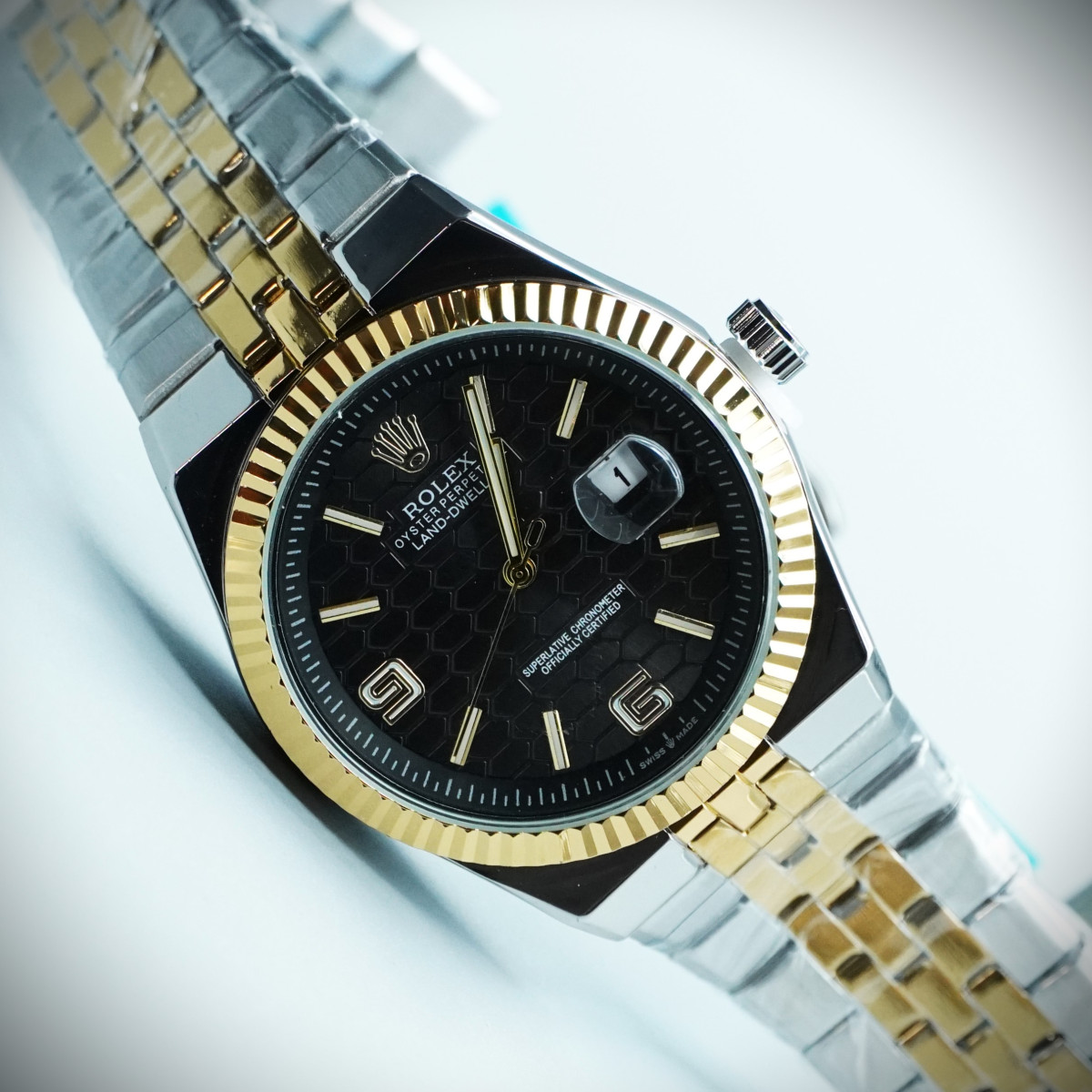 رولکس oyster perpetual مردانه کد (644) بند و قاب نقره ای طلایی صفحه مشکی