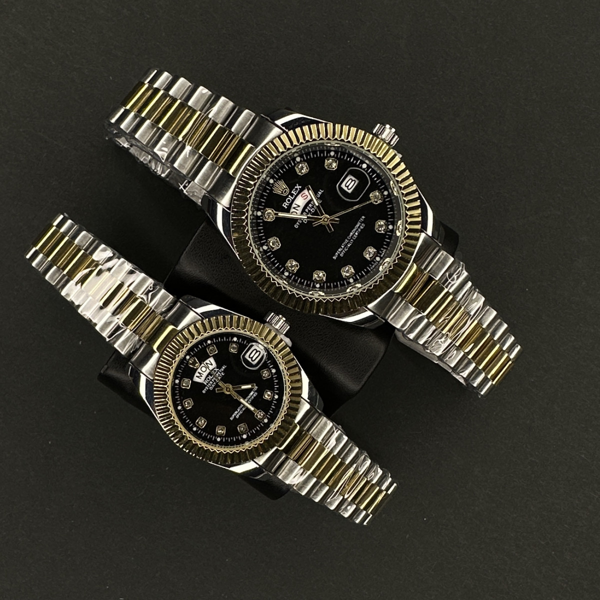 رولکس دو تقویمه کد (6410) صفحه مشکی قاب طلایی بند نقره ای رگه طلایی