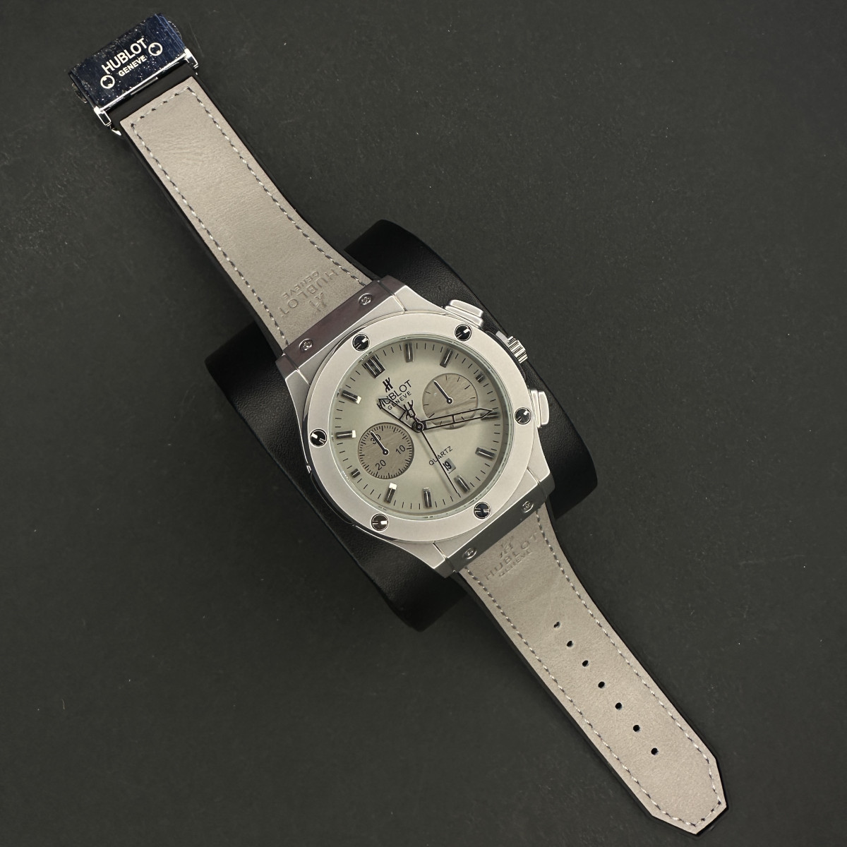 هابلوت مردانه کد(6562)قاب نقره ای صفحه طوسی بند طوسی