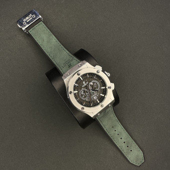 هابلوت مردانه کد(6564)قاب نقره ای صفحه مشکی بند سبز