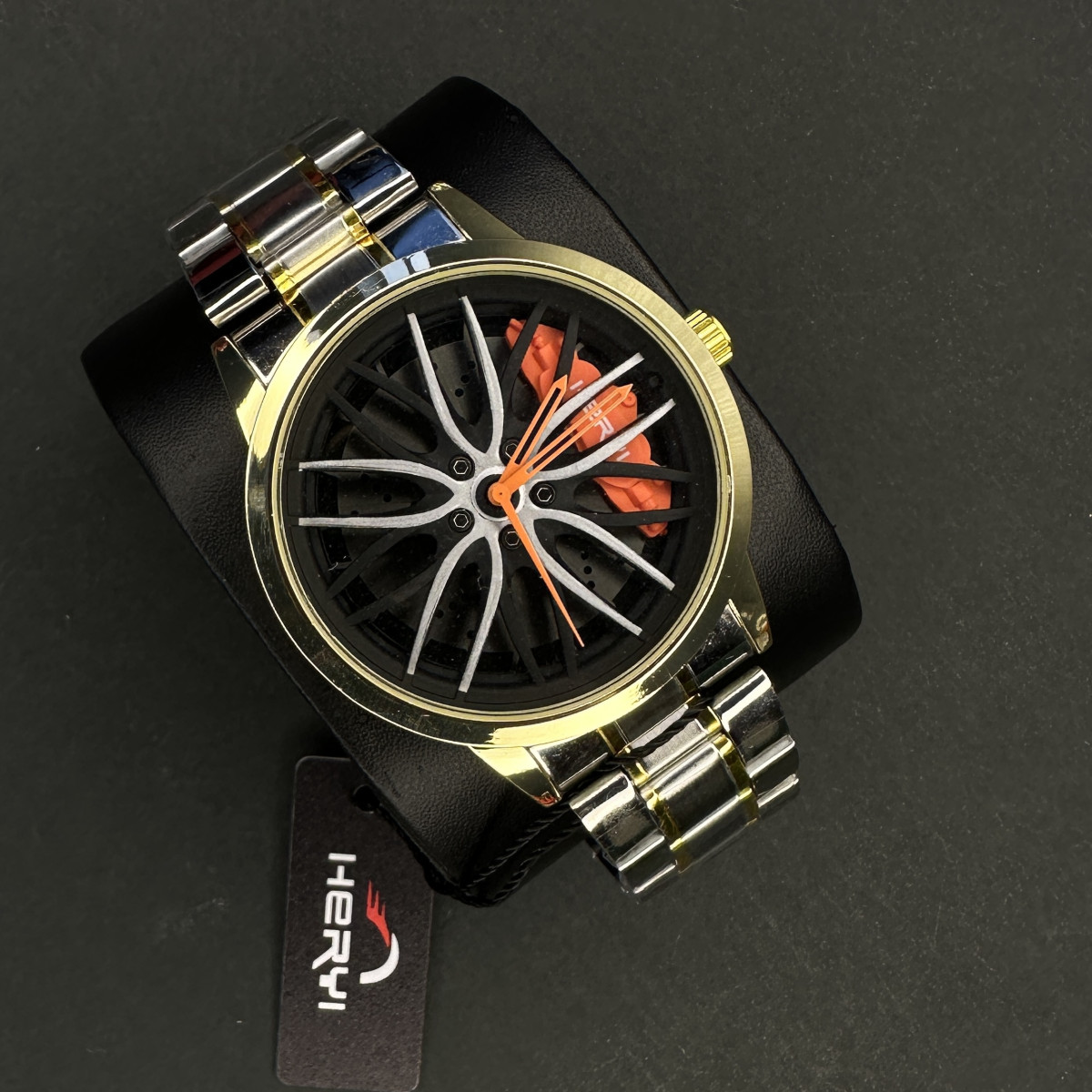 رینگی مردانه کد (6687) قاب طلایی عقربه نارنجی بند طلایی نقره ای